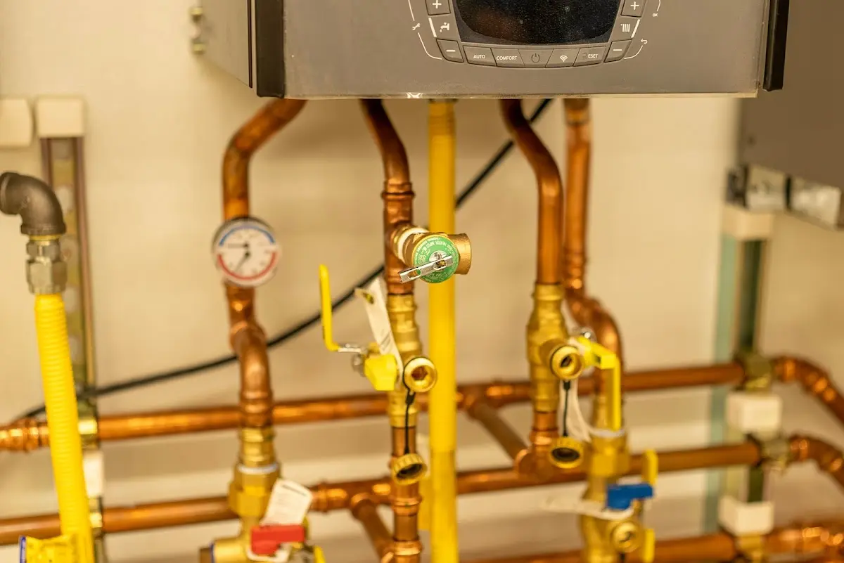 Licensed technician providing Pipe Repair for a homeowner in Mills